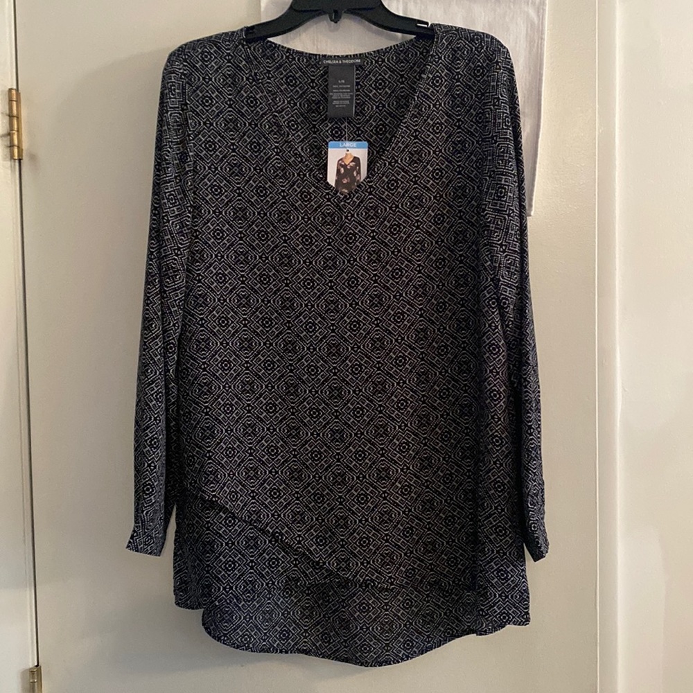 Chelsea and Theodore top. Brand new size large. Black and white Geo print.